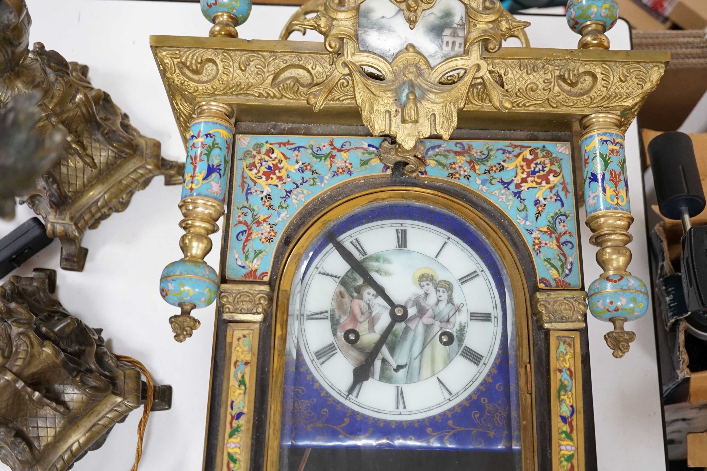 A Chinese cloisonné enamel and gilt metal wall clock, 107cm